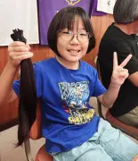 翁長吟次さん（10）4年伸ばした髪を寄付、ヘアドネーションに挑戦
